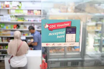 Baucar Majlis Pembangunan Masyarakat (CDC) boleh digunakan di pasar raya yang mengambil bahagian dan separuh lagi boleh digunakan di gerai penjaja dan peniaga di estet perumahan.