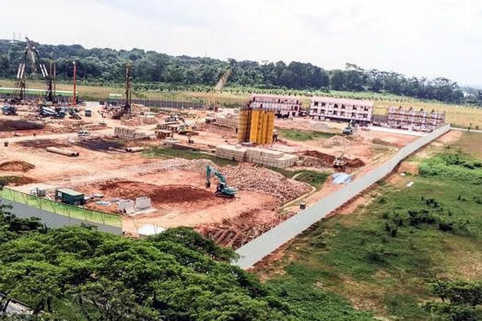 RUMAH IDAMAN, LOKASI IDAMAN: Flat BTO Cik Hamizah Razali dan Encik Muhammad Afiq Abdul Razak, yang kini dalam pembinaan, terletak hanya di hadapan blok orang tua Cik Hamizah dan sekitar lima minit perjalanan kereta dari rumah orang tua Encik Afiq.