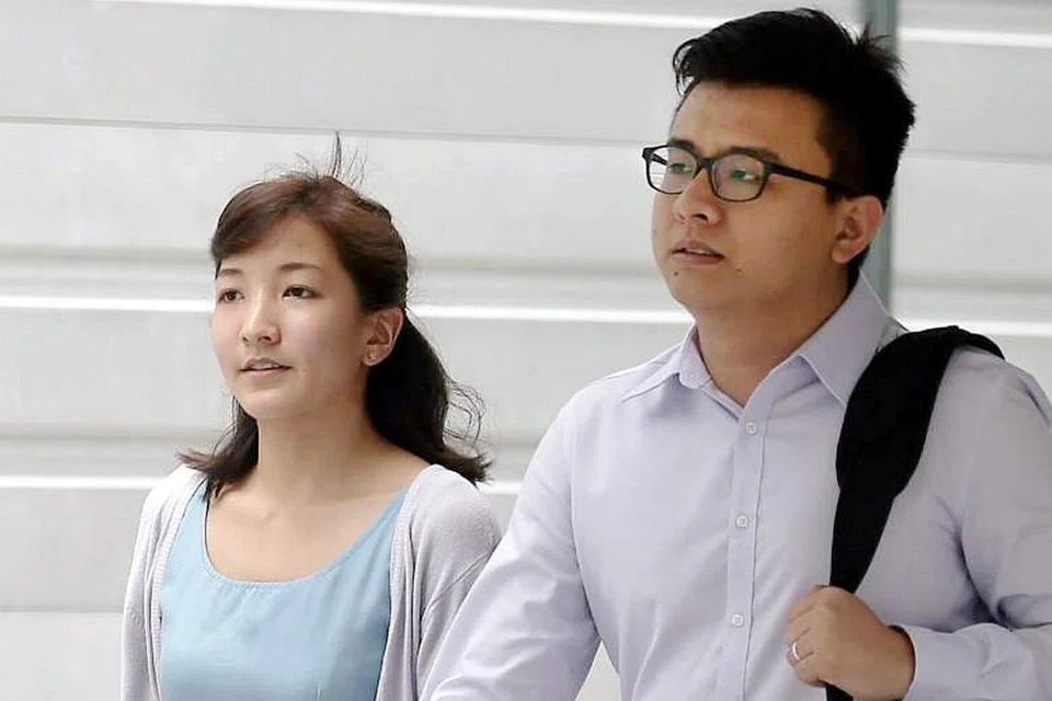 PERNIAGAAN PALING BERJAYA: Pengasas bersama laman 'The Real Singapore', Yang Kaiheng, dan isteri, Ai Takagi, meninggalkan Mahkamah Daerah semalam. - Foto THE STRAITS TIMES