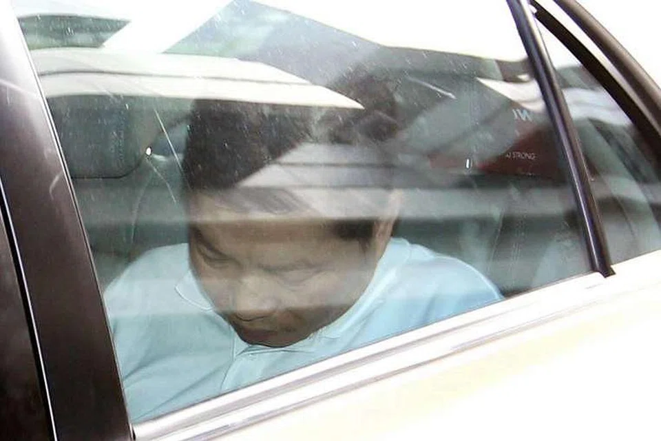 Chia Kee Chen di dalam kereta di luar Mahkamah Rendah pada 2 Jan, 2014.