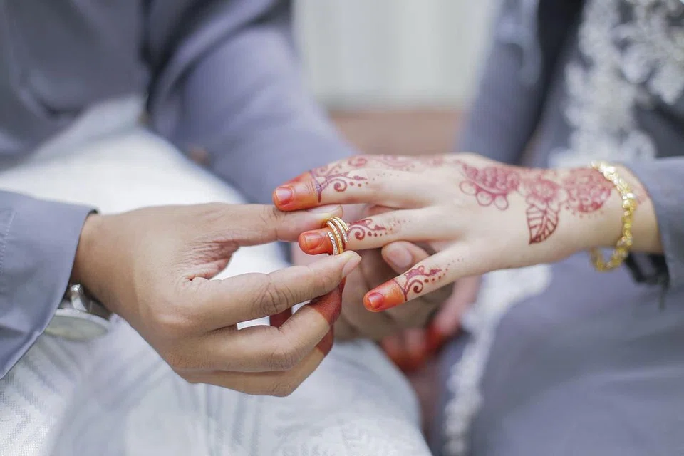 Sehingga 100 hadirin unik, termasuk pasangan pengantin - tetapi tidak termasuk vendor dan penyedia perkhidmatan - akan dibenarkan menghadiri majlis perkahwinan mulai 3 Oktober nanti. - FOTO: ISTOCKFOTO