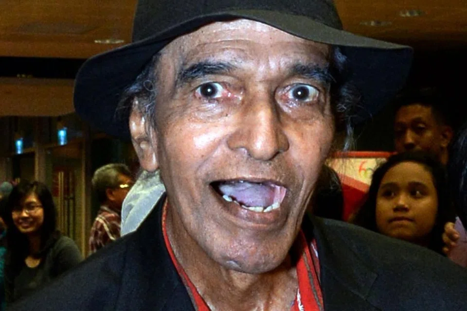 UZUR: Abdul Rashid Yahaya yang lebih dikenali dengan nama Mat Sentol kelihatan riang dalam foto yang diambil pada 2014. - Foto fail