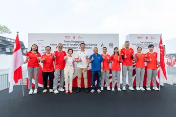 Seramai 304 atlet daripada 27 sukan bakal menggalas cabaran di Sukan Asia Aichi-Nagoya 2026, manakala 13 atlet lagi akan bertanding di Sukan Olimpik Remaja Dakar 2026. Atlet lawan pedang,  Kiria Tikanah Abdul Rahman (paling kiri) berkata semangat berpasukan memainkan peranan penting dalam menghadapi kejohanan tersebut. (Dari kiri) Atlet lawan pedang, Kiria Tikanah Abdul Rahman; Ketua Pegawai Eksekutif Sport Singapore, Alan Goh; Chef de Mission Team Singapore, Goh Kee Nguan; Presiden Majlis Olimpik Kebangsaan Singapura (SNOC) Grace Fu ; Menteri Kebudayaan, Masyarakat dan Belia merangkap Menteri Kedua Pendidikan, Encik David Neo ; Anggota Jawatankuasa Olimpik Antarabangsa, Ng Ser Miang ; Chef de Mission Team Singapore (Sukan Olimpik Remaja Dakar 2026) , Silas Abdul Razak; Penolong Chef de Mission (Sukan Olimpik Remaja Dakar 2026), Fariza Zabir ; Penolong Chef de Mission (Sukan Asia ke-20) Aleksandar Duric;  Kapten Pasukan Sofbol Wanita Cacia Tan dan atlet pasukan Badminton Singapura,  Zack Ng Zhen Hong.