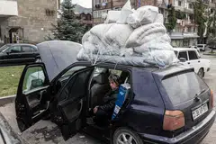 KONFLIK BERAKHIR: Hampir kesemua 120,000 penduduk Karabakh telah melarikan diri dan sekali gus mencetuskan krisis pelarian.