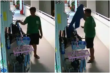 Seorang penghantar makanan GrabFood dirakam mencuri tuala di luar flat HDB. FOTO: TANGKAP LAYAR DARI YOUTUBE