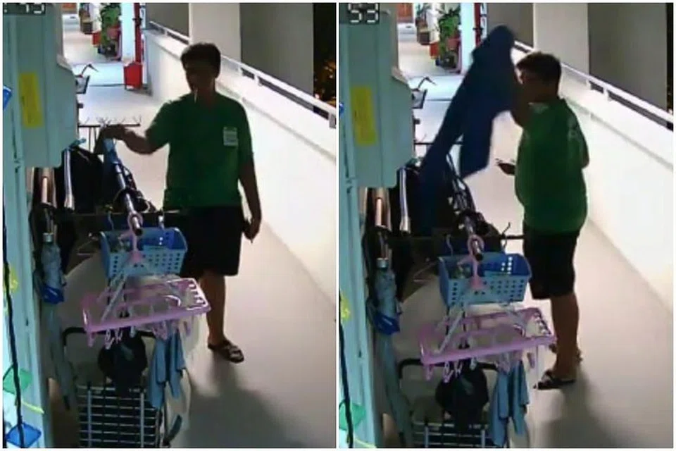 Seorang penghantar makanan GrabFood dirakam mencuri tuala di luar flat HDB. FOTO: TANGKAP LAYAR DARI YOUTUBE