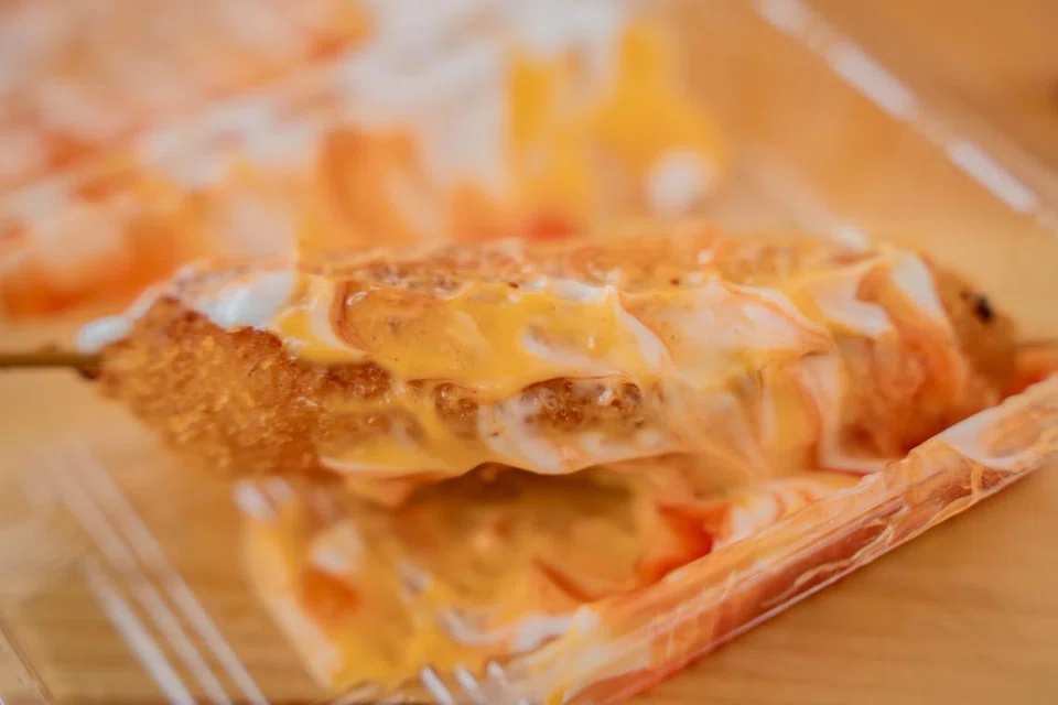 Corndog, $5, oleh Boolatz Kitchen.