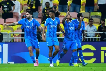 Penyerang Al-Hilal, Malcolm (dua dari kanan), meraikan golnya pada minit ke-95 yang membantu pasukannya menewaskan Al-Ittihad 2-0 pada peringkat suku akhir Liga Juara-Juara Asia pada 13 Mac di Stadium King Abdullah Sports City.