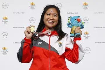 EMAS SULUNG SINGAPURA: Martina Veloso meraikan emas kemenangannya selepas bertarung hebat dalam pusingan penentuan sebelum memenangi acara menembak 10 meter rifel angin. - Foto SPORTSG