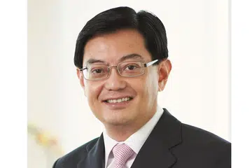 PIKUL TANGGUNGJAWAB TAMBAHAN: Selain Kementerian Kewangan, Encik Heng Swee Keat akan juga membantu Perdana Menteri dalam hal-hal melibatkan Yayasan Penyelidikan Kebangsaan. - Foto MCI