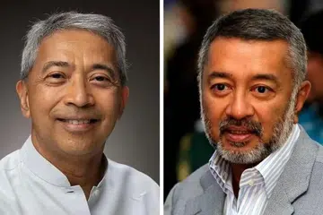 Dua anak lelaki mantan Perdana Menteri Malaysia, Tun Dr Mahathir Mohamad, iaitu Tan Sri Mokhzani (kanan) dan Encik Mirzan (kiri).