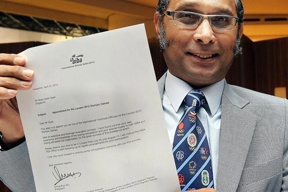 Legenda tinju Olimpik negara dan juga Presiden Persatuan Tinju Amatur Singapura (Saba), Syed Abdul Kadir Syed Abu Bakar (gambar atas)