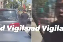 TENGKARAH: Klik video ini menunjukkan pemandu sebuah kereta Volkswagen kelihatan cuba memaksa buka pintu kenderaan di belakangnya beberapa kali sebelum menghentak tangannya di tingkap pintu bahagian pemandu.