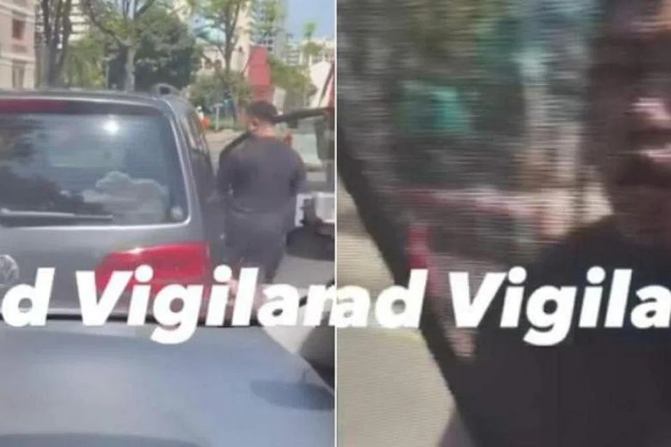TENGKARAH: Klik video ini menunjukkan pemandu sebuah kereta Volkswagen kelihatan cuba memaksa buka pintu kenderaan di belakangnya beberapa kali sebelum menghentak tangannya di tingkap pintu bahagian pemandu.