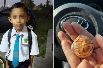 Mohamad Fahmi Hafiz Mohamad didapati rebah luar sekolah setelah memakan gula-gula kenyal berbentuk bola mata. 