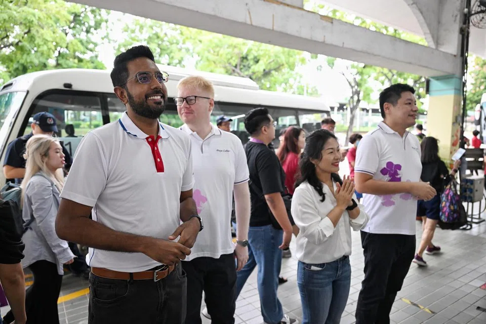 Antara barisan bakal calon PAP di GRC Aljunied bagi GE2025 ialah (dari kiri) Dr Faisal Abdul Aziz, Encik Daniel Liu dan Cik Chan Hui Yuh.