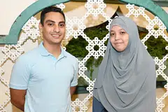DEKATI MASYARAKAT: Encik Omer dan Cik Leila ialah antara pelajar universiti dan politeknik, yang menerima dermasiswa Al-Wehdah tahun lalu. - Foto BH oleh KHALID BABA