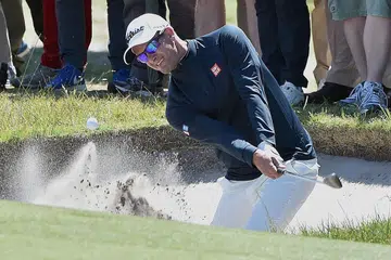 TIGA YANG TERBAIK: Ernie Els, Adam Scott (atas) dan Sergio Garcia, yang di kalangan mereka pernah menjuarai kejohanan 'Major' golf dunia dan pelbagai kejuaraan PGA lain, merupakan antara tarikan utama di edisi ke-51 Kejohanan Golf Terbuka Singapura SMBC kali ini yang berlangsung di Sentosa Golf Club pada Khamis hingga Ahad ini. - Foto AFP
