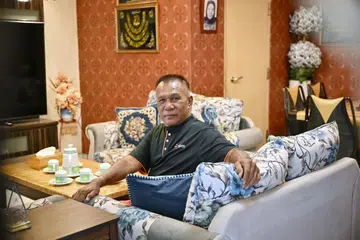 Encik Ramli Daud, 67 tahun, memilih untuk terus tinggal di flat empat biliknya di Jurong West selama 30 tahun lagi dengan memanfaatkan Skim Beli Balik Pajakan. 