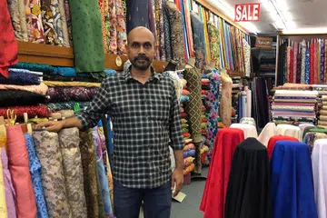 PERTAHAN NIAGA KELUARGA: Encik Habibullah, pemilik generasi ketiga Molkan Enterprise dan Eleganz by Molkan Fabrics, perlu mengeluarkan wang simpanan untuk terus bertahan semasa tempoh yang mencabar ini. - Foto BH oleh NATASHA MUSTAFA