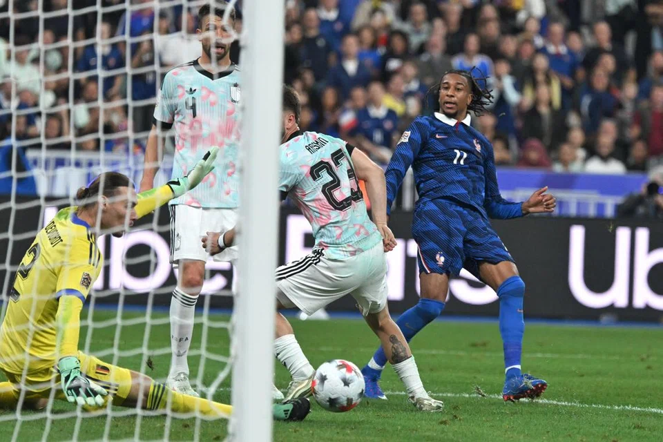 Pemain Perancis, Michael Olise (kanan) menjaringkan gol keempat pasukan pada perlawanan Liga Negara-Negara Uefa menentang Belgium di Stade de France, Saint-Denis, Perancis, pada 5 Oktober.