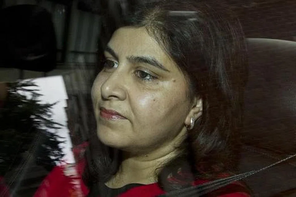 CIK SAYEEDA WARSI: Anggotai kabinet sejak 2010. - Foto AFP