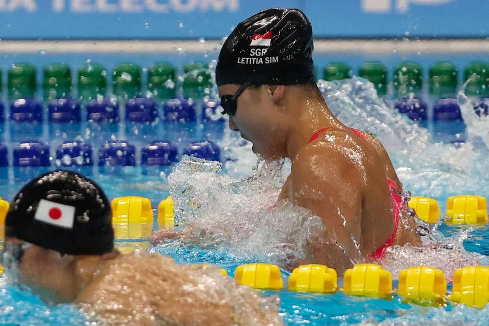TERLEPAS PINGAT: Perenang negara, Letitia Sim nyaris memenangi pingat dalam acara 100 meter kuak dada wanita pada Rabu. Beliau mengakhiri perlumbaan 0.12 saat di belakang pemenang pingat gangsa. 