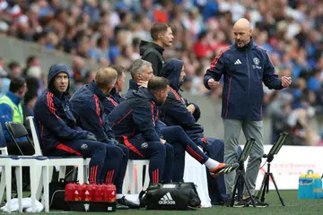 Pengurus Manchester United, Erik ten Hag (kanan), bersama pasukan jurulatihnya ketika perlawanan persahabatan menentang Rangers pada 20 Julai. 