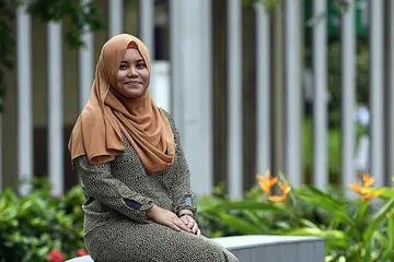 CABARAN TERSENDIRI: Pegawai eksekutif di Pusat Oasis Cik Sri Nur Aliffah berkata latar belakang setiap anak titipan berbeza dan masing-masing mengalami cabaran tersendiri.