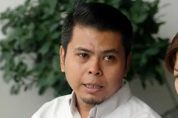 DIPENJARA: Umar yang bertugas di Divisyen Polis Ang Mo Kio mengaku bersalah terhadap dua tuduhan menganggotai kumpulan terlarang.