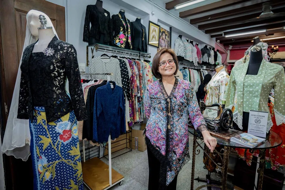 Pengasas Kebaya by Ratianah, Cik Ratianah Tahir, di kedainya yang terletak di Bussorah Street.