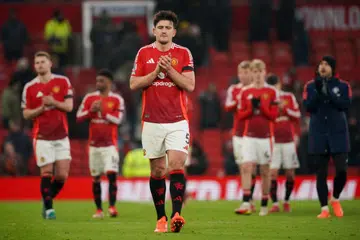 Kemenangan di Old Trafford mencatat sejarah apabila dua pemain pertahanan, salah seorangnya Harry Maguire (tengah), menjaringkan gol untuk Manchester United dalam perlawanan Liga Perdana England (EPL) yang sama.