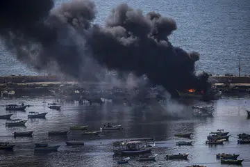 PENGEBOMAN BERTERUSAN: Asap tebal dilihat di Pelabuhan Gaza ekoran serangan udara berterusan Israel pada Khamis yang dikhuatiri bakal menyebabkan krisis kemanusiaan di kawasan itu semakin buruk.