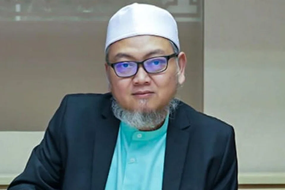 Ustaz Mohd Kamal Mokhtar. 