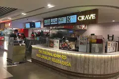 CONTOH KEJAYAAN: Antara kisah kejayaan peniaga dari rumah, menurut penulis, ialah Nasi Lemak Selera Rasa Adam Road yang kini pesat berkembang di bawah jenama Crave. - Foto fail