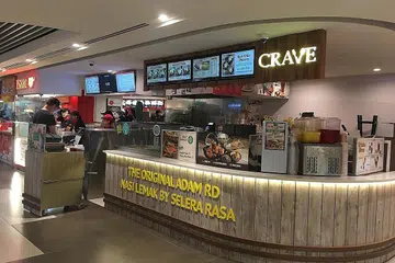 CONTOH KEJAYAAN: Antara kisah kejayaan peniaga dari rumah, menurut penulis, ialah Nasi Lemak Selera Rasa Adam Road yang kini pesat berkembang di bawah jenama Crave. - Foto fail