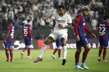 RAI JARINGAN GOL: Pemain Real Madrid, Rodrygo, meraikan gol keempat semasa perlawanan menentang FC Barcelona di Stadium Al-Awwal, Riyadh.