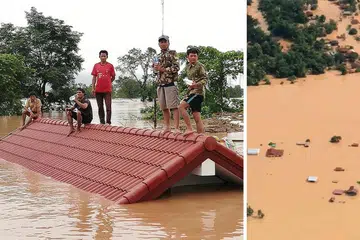 SEMUA TENGGELAM: Gambar-gambar yang diambil kelmarin di wilayah Attapeu ini menunjukkan seluruh perkampungan di situ ditenggelami air ekoran empangan yang pecah, dengan penduduk terkandas di atas bumbung rumah sambil menantikan diselamatkan. - Foto-foto AFP