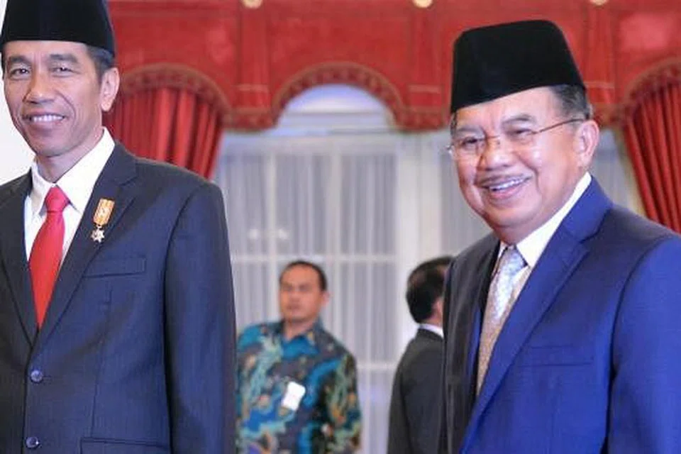 SETAHUN MEMIMPIN: Pasangan 'Jokowi-JK' berjaya meningkatkan prestasi perkhidmatan awam dan menarik pelaburan ke Indonesia. - Foto THE JAKARTA POST