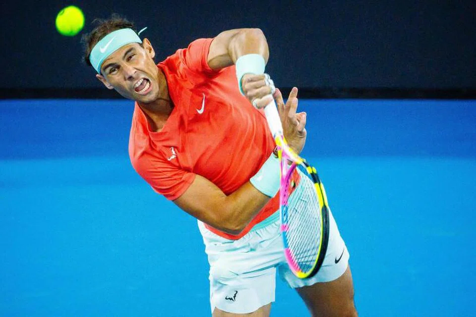 KEMBALI BERSAING: Pemain Sepanyol, Rafael Nadal, membuat pukulan ketika berganding dengan Marc Lopez menentang pemain Australia, Max Purcell dan Jordan Thompson, semasa perlawanan beregu lelaki di Kejohanan Tenis Antarabangsa Brisbane, di Brisbane pada 31 Disember.
