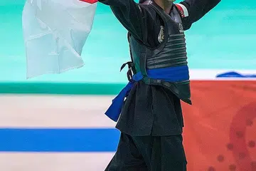 DEPAN NEGARA: Muhammad Hazim menjuarai acara silat tanding kelas 'B' dalam penampilan sulungnya di Sukan SEA. - Foto SPORT SINGAPORE
