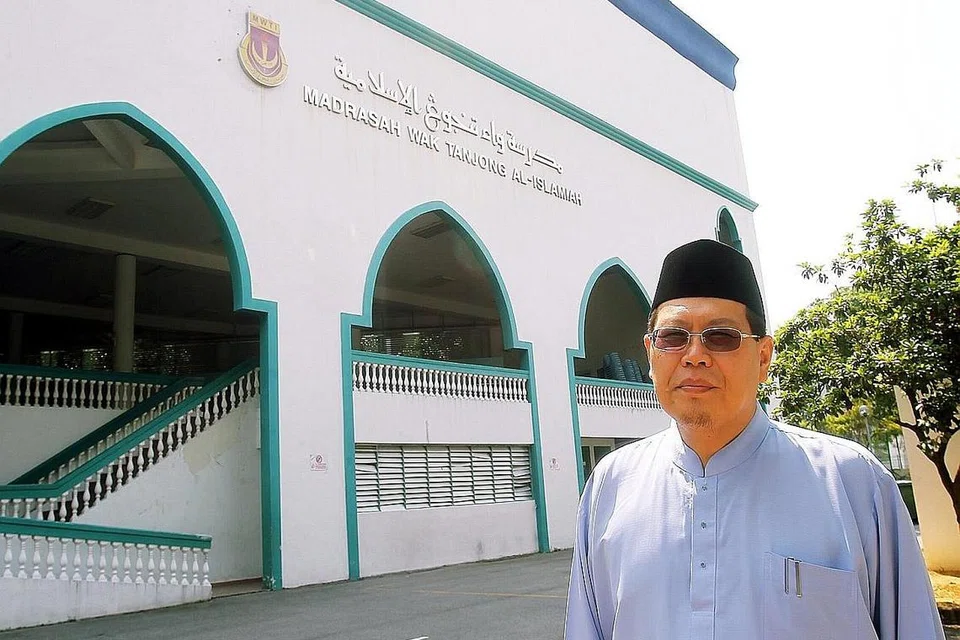 MENJADIKAN SEKTOR MADRASAH LEBIH PROFESIONAL: Madrasah Wak Tanjong Al-Islamiah akan menerima pakej bantuan menyeluruh oleh Majlis Ugama Islam Singapura (Muis). Sebagai sebahagian daripada pakej itu, Muis akan membeli pajakan 30 tahun dan satu hari baru daripada Penguasa Tanah Singapura (SLA) bagi melanjutkan tempoh pajakan madrasah itu di premisnya kini di Sims Avenue. - Foto fail