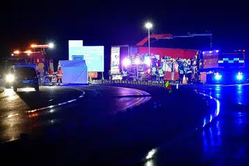 LOKASI NAHAS: Kereta yang dinaiki Encik Lars Vilks bertembung sebuah trak berdekatan bandar kecil Markaryd sebelum kedua-dua kenderaan itu terbakar. - Foto AFP