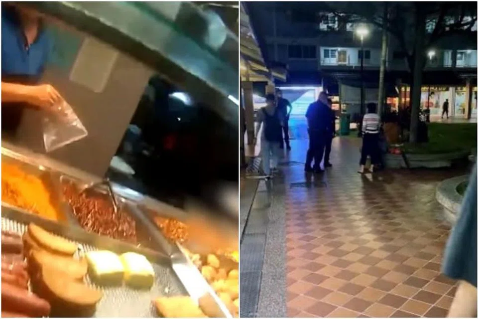 DUDUK PERKARA SEBENAR: Keratan video kamera lekap tubuh yang dikeluarkan polis menunjukkan seorang pegawai polis membelikan sebungkus makanan buat wanita berusia itu daripada gerai berdekatan dan tidak mencemuh atau memarahinya. - Foto TANGKAP LAYAR FACEBOOK PASUKAN POLIS SINGAPURA/TANGKAP LAYAR FACEBOOK DE LONG 