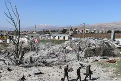 Kesan serangan udara Israel ke atas sebuah perkampungan di Lubnan. Lubnan terjerumus dalam kancah perang di Timur Tengah menyusuli serangan kumpulan Hezbollah ke atas Israel. 