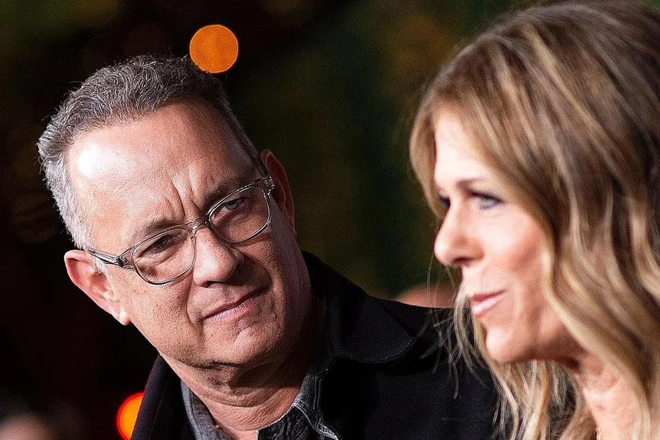 BUAT PENGUMUMAN MENGEJUT: Pelakon Tom Hanks dan isteri, Rita Wilson (gambar fail pada 7 November 2018), mengejutkan peminat dengan pengumuman bahawa mereka diuji positif Covid-19 pada 11 Mac lalu. Kededua mereka diasingkan seberapa lama di Australia, di mana Hanks sedang merakam filem, demi kesihatan dan keselamatan awam. - Foto AFP.