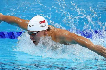 GAGAL PERTAHAN TAKHTA: Joseph Schooling gagal mempertahankan pingat emas yang diraihnya di Rio 2016 selepas tersingkir di saringan kupu-kupu 100 meter lelaki. - Foto REUTERS
