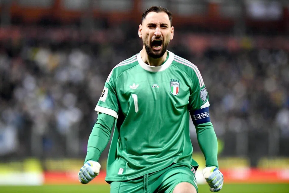 Penjaga gol Italy, Gianluigi Donnarumma, meraikan jaringan gol pembukaan pasukannya dalam perlawanan penentu kelayakan Piala Dunia Fifa 2026 zon Eropah antara Bosnia-Herzegovina dengan Italy di Zenica, Bosnia-Herzegovina, pada 31 Mac.