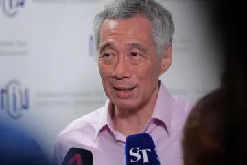 ISU TUDUNG DAN JURURAWAT: PM Lee menjangkakan akan mengumumkan keputusan pemerintah di Rapat Umum Hari Kebangsaan pada akhir Ogos ini.