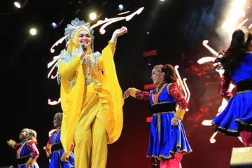 TARIK SAMBUTAN RIBUAN ORANG: Konsert Datuk Siti Nurhaliza di Singapore Expo dihadiri 5,000 orang tahun lalu. - Foto fail